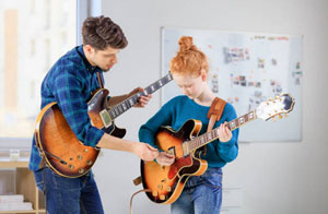Guitar Teacher Reading (0118)